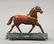 Brown Horse on Platform