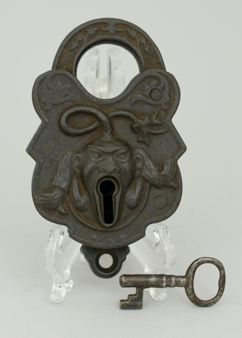 "John Chinaman" Padlock: Trenton Lock & Hardware Co. Trenton, NJ. - Circa 1879 - 3.75" H A very scarce and desirable early padlock. Cast Iron