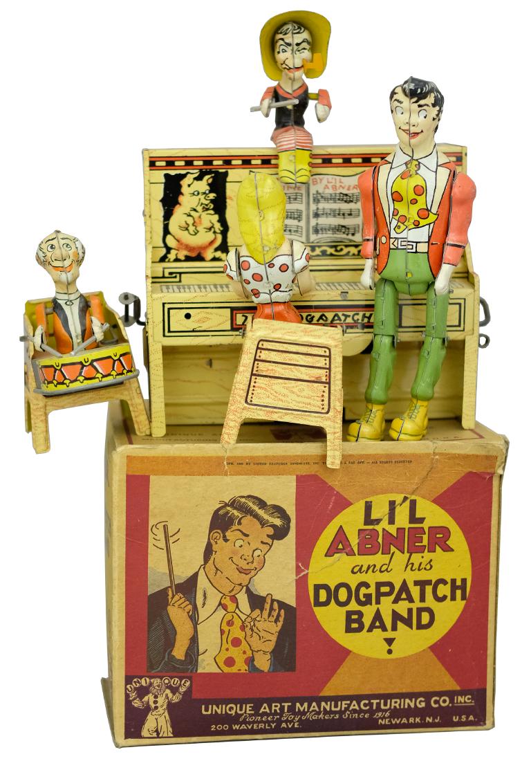 Li’l Abner's Dog Patch Band with Box: By Unique Art Mfg. Company; Newark, NJ - Circa Late 1940’s. Unique Art scored a huge success with their Dog Patch Band for the Christmas of 1945. The toy features a dancing Abner, Pappy on the drums