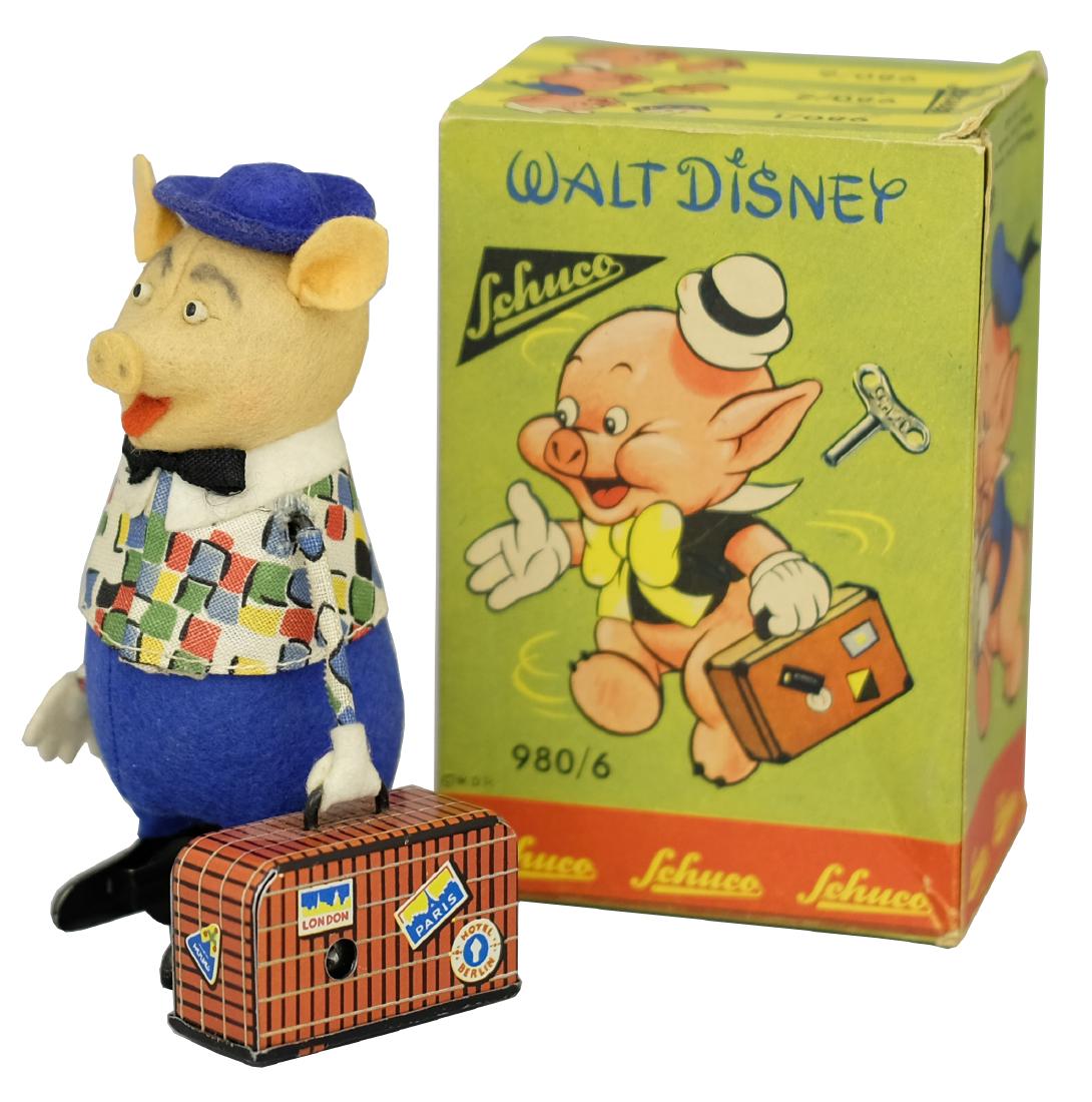 Traveling Pig with Suitcase: Made by Schuco Toys; Germany - Circa Late 1940’s.
