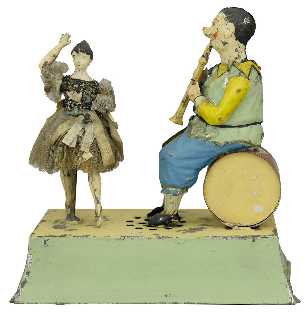 Clarinetist and Ballerina: Made by Sigmund Gunthermann; Germany - Circa Early 1900’s. This is one of the most iconic models from Gunthermann’s series of staged platform toys. Exceptionally fine condition.