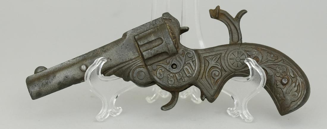 "6 Shot Cap Gun: J. & E. Stevens Company Cromwell, Ct. - June 22, 1895 Cast Iron
