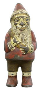 Santa with Pack: Arcade Mfg. Co. Freeport, IL. - Circa 1932 Only 4 or 5 of these Santaâ€™s are known to exist. Round shouldered, short and squat. Cast Iron