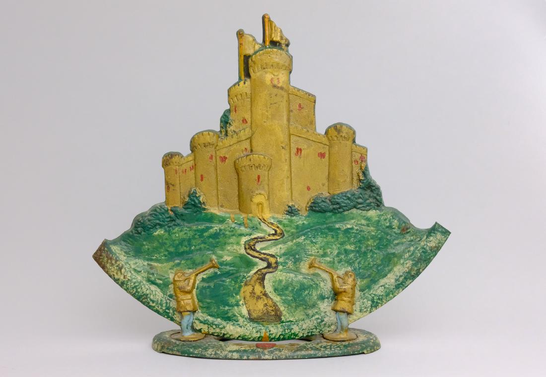 Castle with Trumpeters: Probably Continental - 1920 - 14.5â€ W x 13.5â€ T We have previously not seen this doorstop. Cast Iron