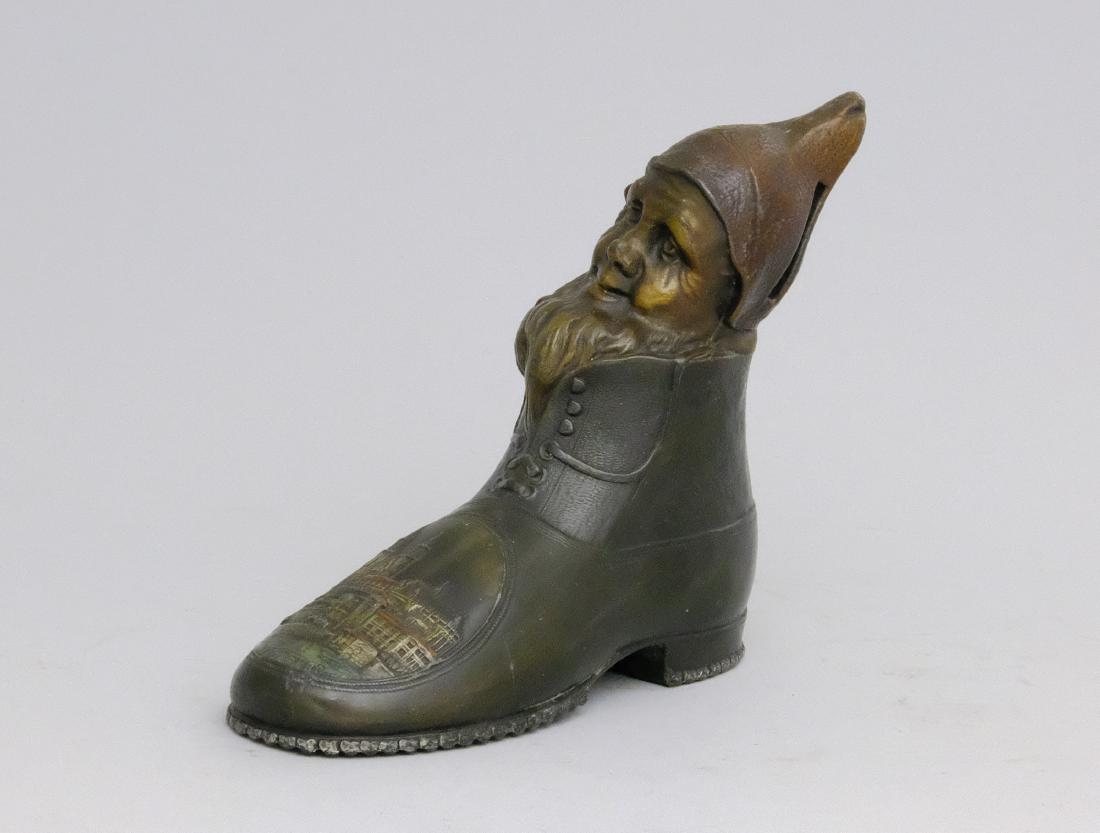 Elf in a Shoe: Germany - Circa 1920's With a medallion for Magdeburg, Germany. Silvered Lead