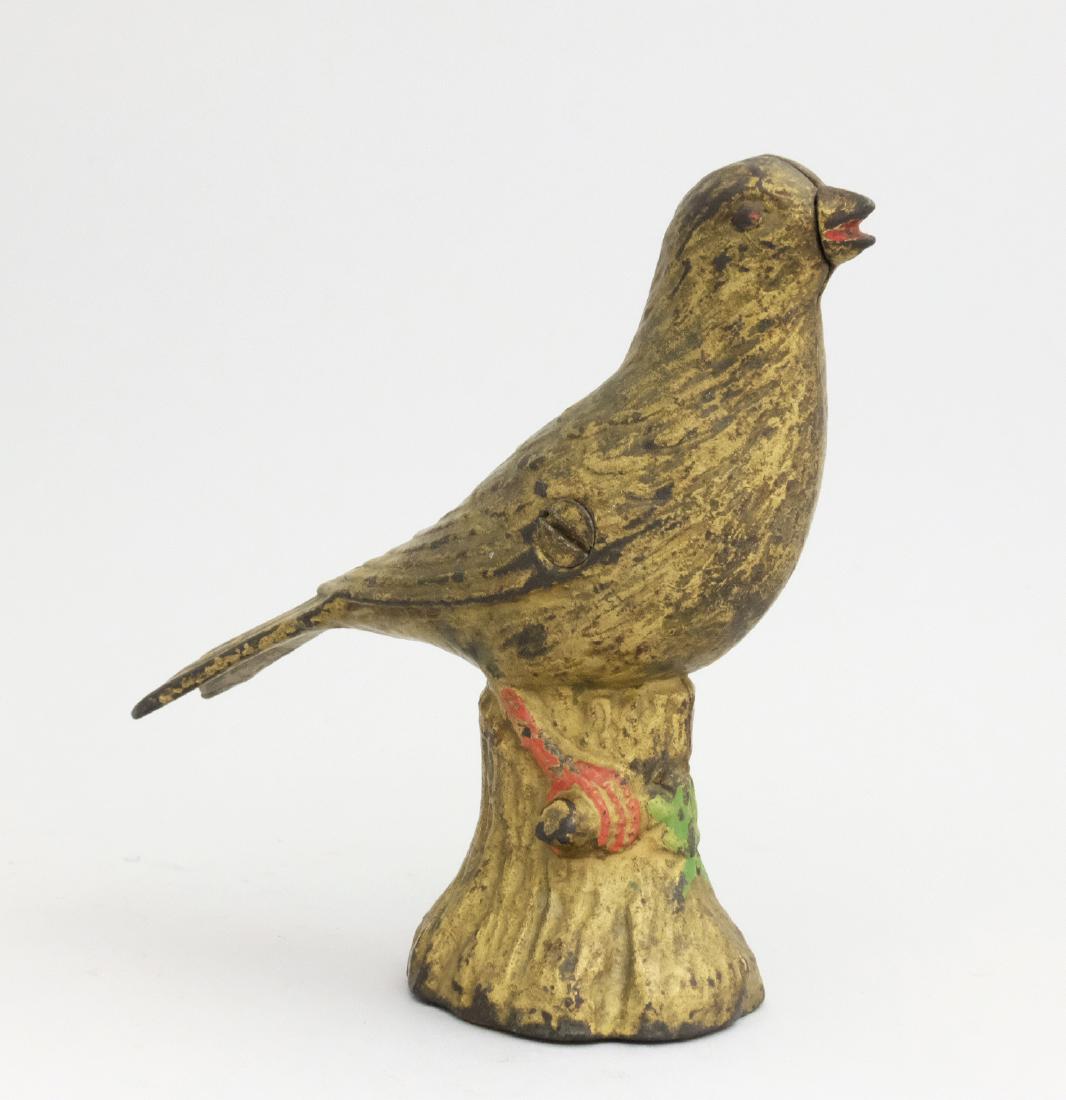 Songbird on Stump: A. C. Williams Ravenna, OH - 1920's A scarce bird bank that is in lovely condition. Material: Cast Iron