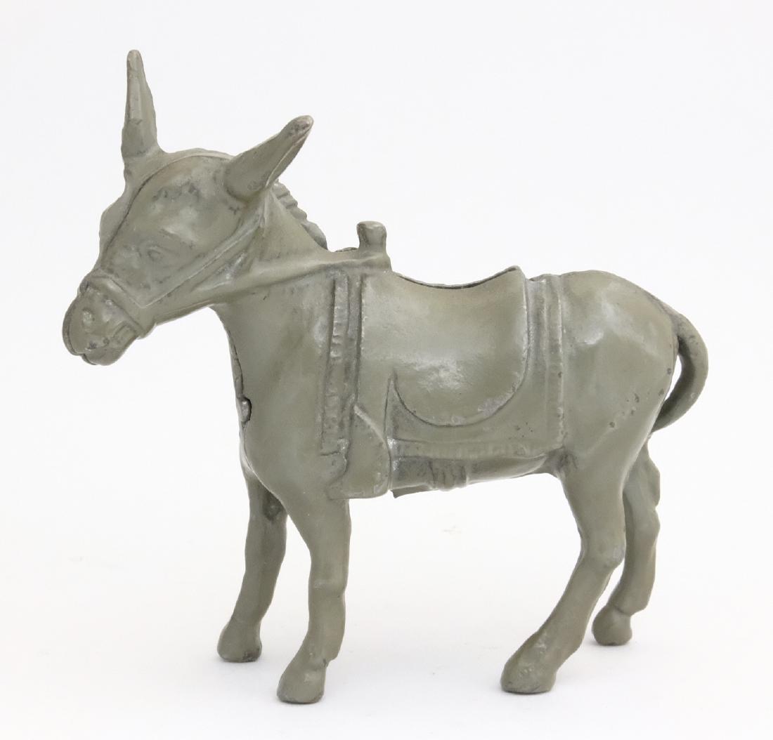 Donkey - Small, Gray: Arcade Mfg. Co. Freeport, IL - 1920 Another very scarce color variant. Material: Cast Iron