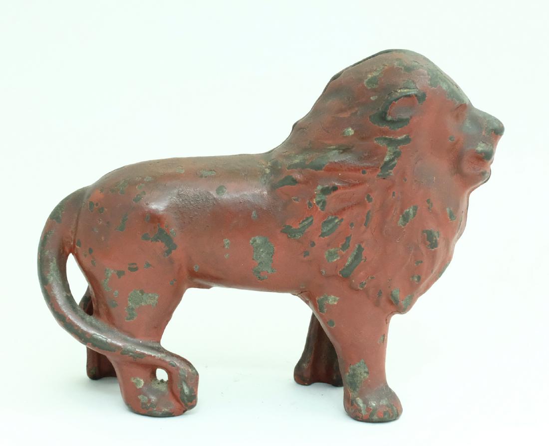 Lion - Tail Right - 4" T: Arcade Mfg. Co. Freeport, IL - 1920 A very scarce size and color. Material: Cast Iron