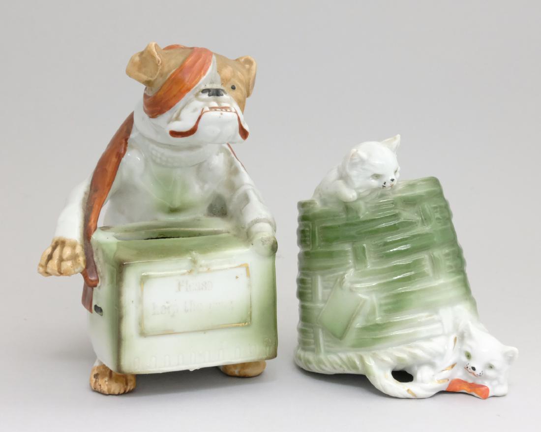 Cats in Basket / Dog with Hurdy Gurdy: Austrian - 1915 - 3.5" - 5" T The Dog's hurdy gurdy reads "Please Help the Poor". Material: Glazed Bisque