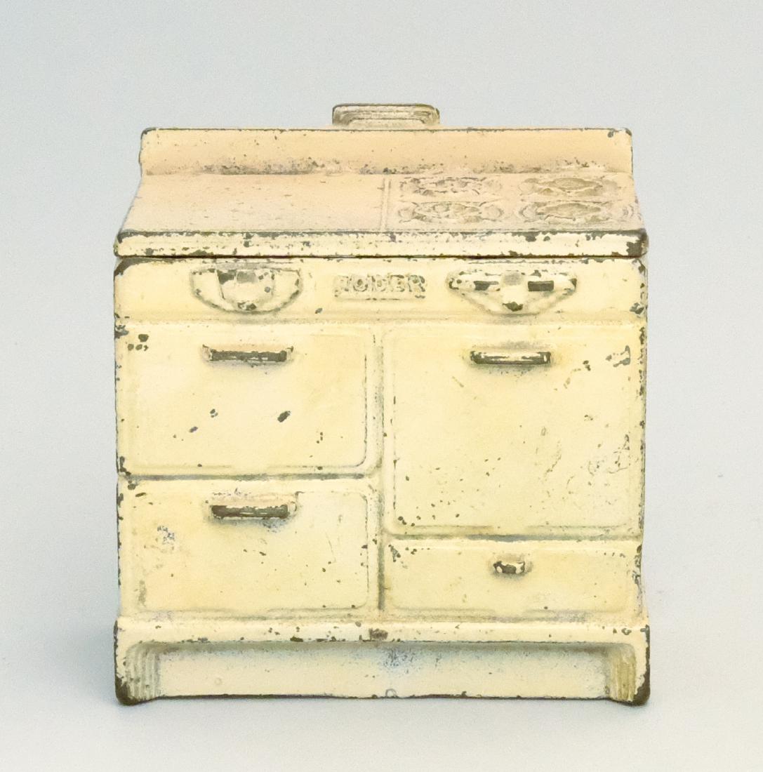 "Roper" Stove: Arcade Mfg. Co. Freeport, IL - 1932 A scarce version where the burner covers do not lift up. Intact Arcade Label. Material: Cast Iron and Sheet Steel