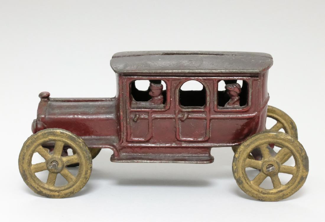 Auto (4 Passengers) - Small: A. C. Williams Ravenna, OH - 1915 This is the scarce diminutive version of the bank. Material: Cast Iron