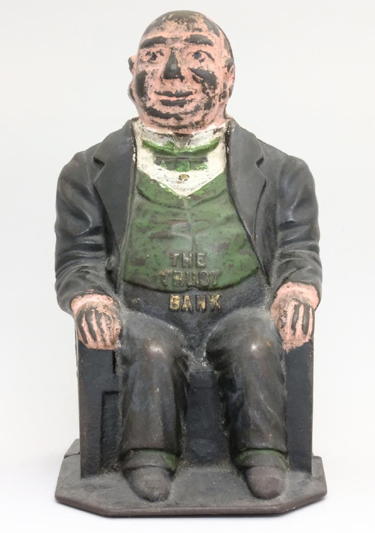 The Trust Bank: J. & E. Stevens Co. Cromwell, CT - 1890 Just another banker who has gotten fat on the profits Congress gives them when they need a bailout. Material: Cast Iron