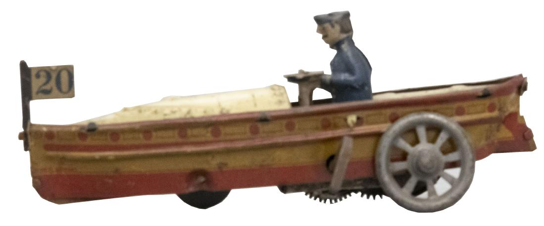 Penny Toy Windup Race Boat: German - Circa 1920's - 5" L The toy works sporadically. Material: Tin