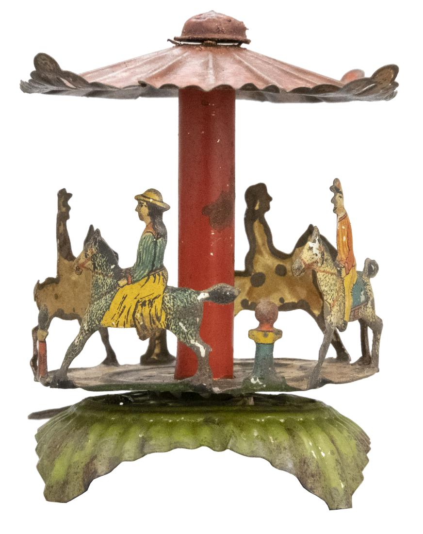Merry Go Round Penny Toy: J. Meier German - Circa 1920's Material: Tin