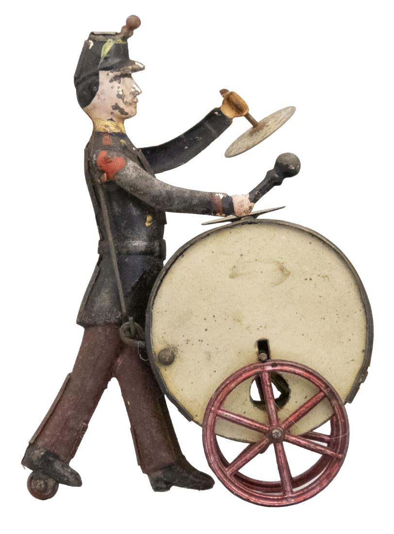 The Drummer - Gyroscopic: French - Circa 1895 - 3.75" T This is the small version of the toy. It works well. Material: Tin