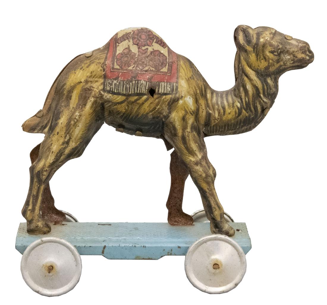 Camel on Platform: German - Circa 1930's - 4" L Material: Tin