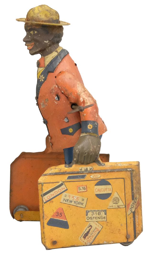 Porter with Luggage: J. Distler Nuremburg, Germany - Circa 1920's - 7.25" T Works well. Material: Tin
