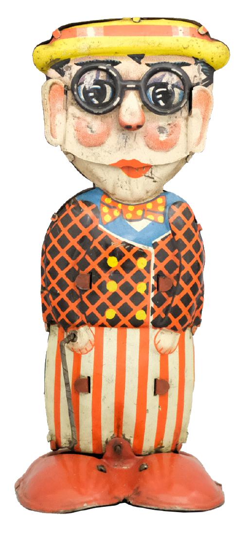 Harold Lloyd Walking Figure: Charles Kellermann (CKO) Germany - Circa 1920's - 7" T Harold Lloyd was a famous silent movie actor. This comical toy works very well. Material: Tin