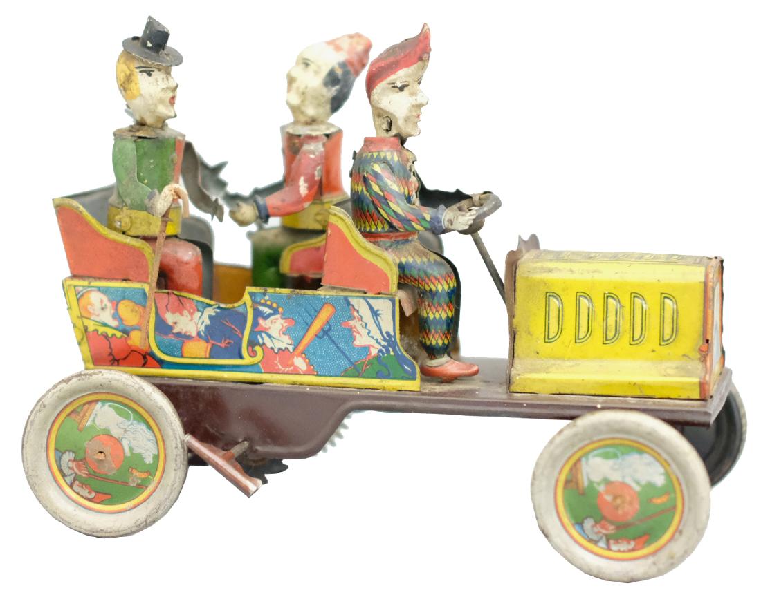Comical Clowns Car: Hans Eberl German - Circa 1920's - 7.25" L Another colorful and inventive toy by Hans Eberl. The toy works well. Material: Tin