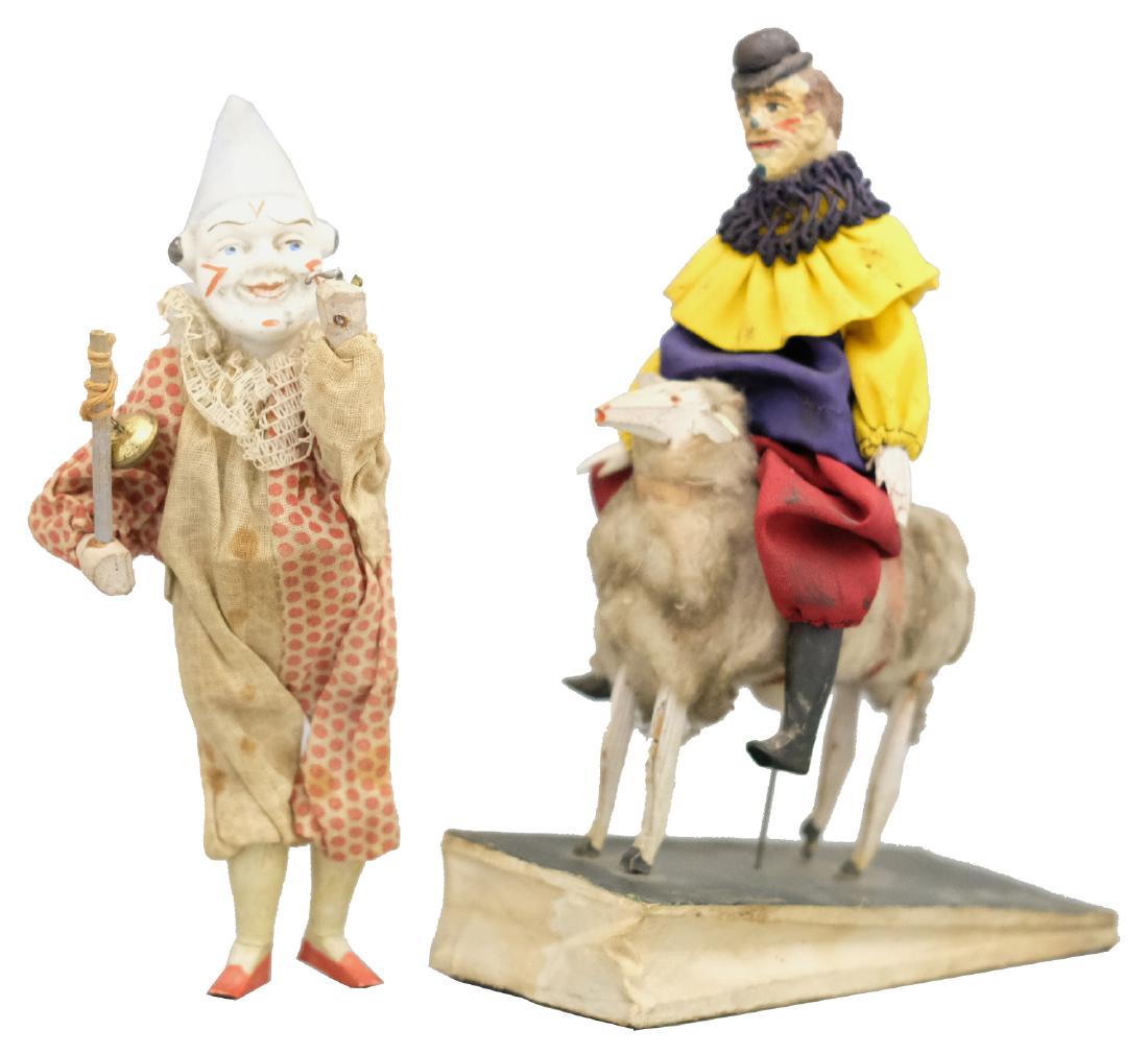 Two Clown Squeak Toys: German - Circa 1890/1910 - 7.5"/8" T Both work well. Standing clown missing half a bugle. Material: Composition, bisque and fabric