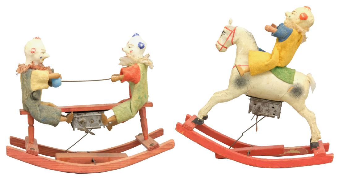 Two Clown Themed Rocking Toys: German - Circa 1920's - 8.25"/6.25" T Both of these rocking toys are colorful and work extremely well. Material: Composition, wood, and fabric