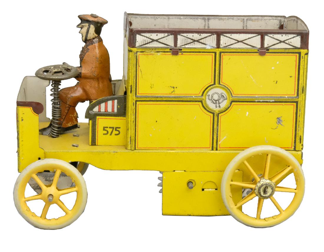 "Auto Post" (EPL No. 575)Mail Van - Scarce Yellow: Production Run: 1907-1935 We have not seen this toy in yellow lithography before. It is in Pristine Condition. Material: Tin