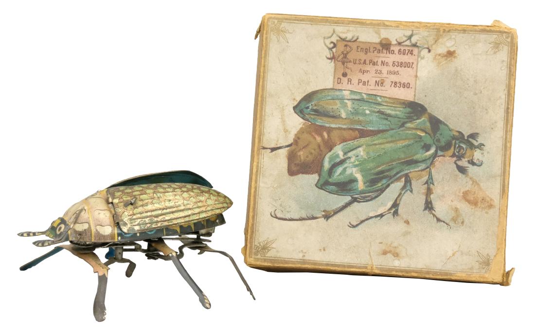 "Beetle" (EPL No. 451): Production Run: 1898-1935 This is an early version of the toy with a colorful original box. Material: Tin