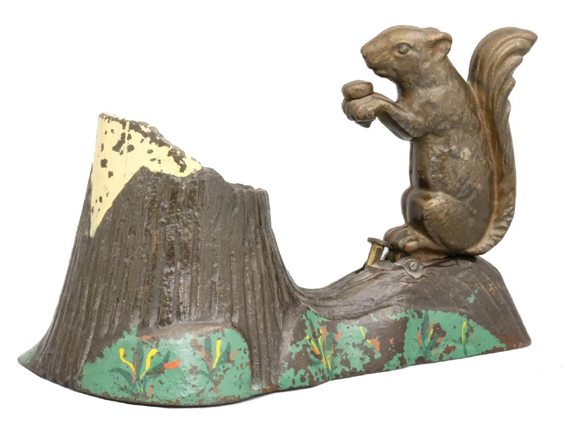 Squirrel & Tree Stump: Mechanical Novelty Works New Britain, CT - Circa 1880's Like the squirrel who saves acorns in a hollowed out tree stump, the child who saves pennies will turn them into dollars and therefore never go
