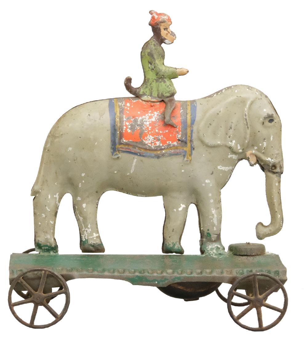 Monkey Riding Jumbo Bell Toy: James Fallows Philadelphia, PA - Circa 1880's - 7.25" L Material: Tin