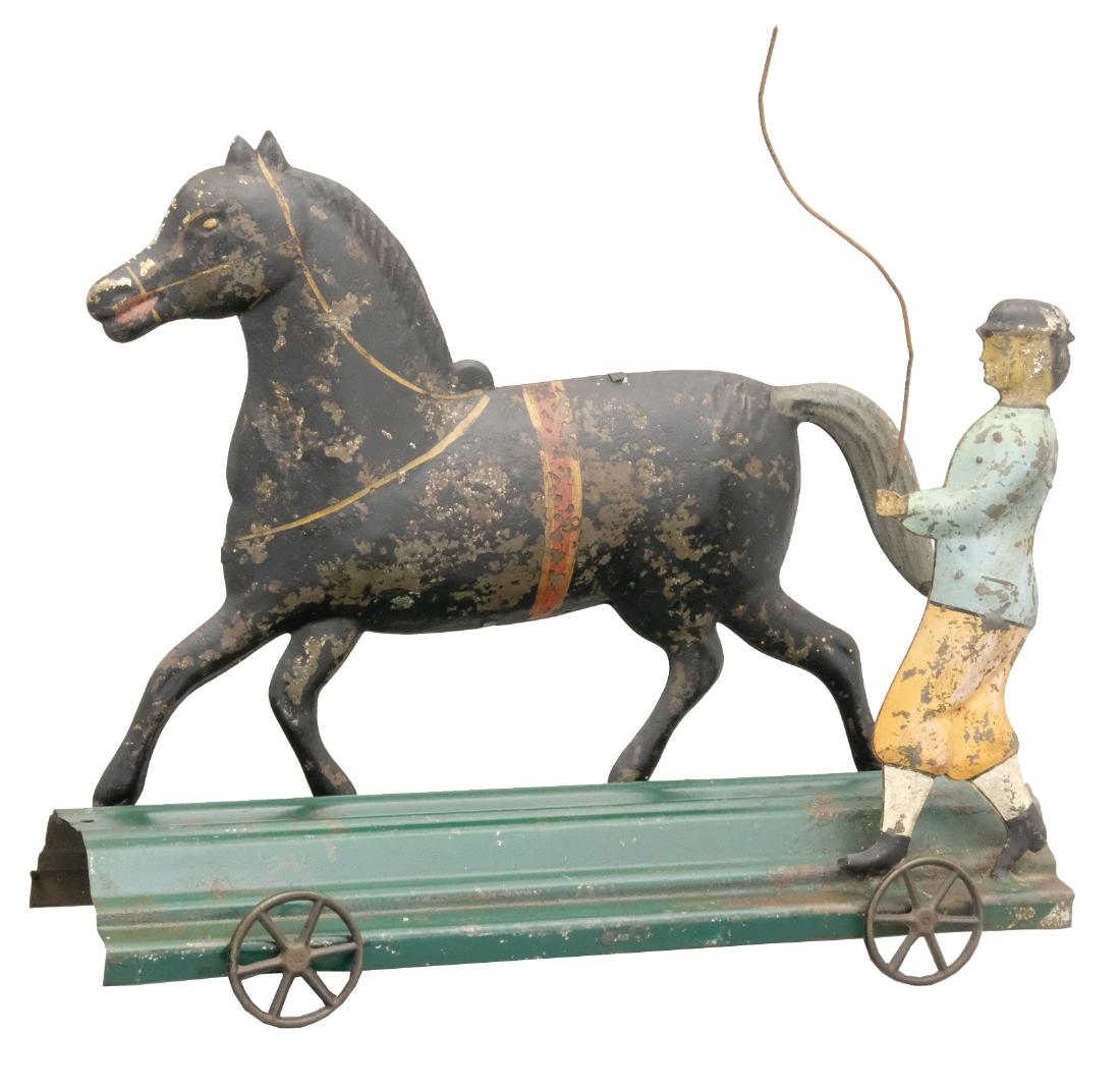 The Horse Trainer: George Brown Forestville, CT - Circa 1880's - 10" L This is a scarce American tin toy with a great female figure. Material: Tin