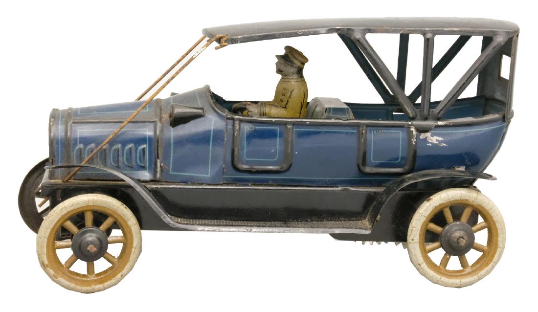 Open Touring Car: Gebruder Bing German - 1920's - 7.75" L The toy works well Material: Tin