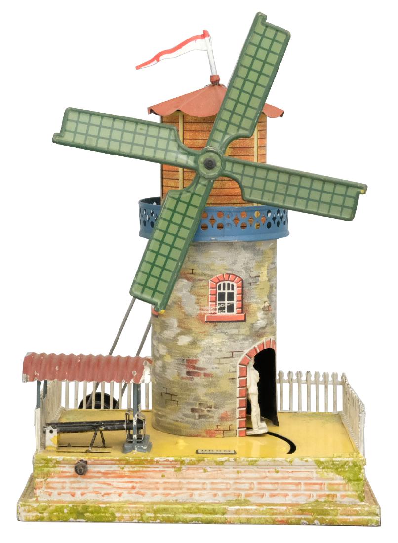 Windmill Steam Attachment: German - Circa 1930 - 11" T As the windmill turns, the man goes in and out of the building. Material: Tin and lead