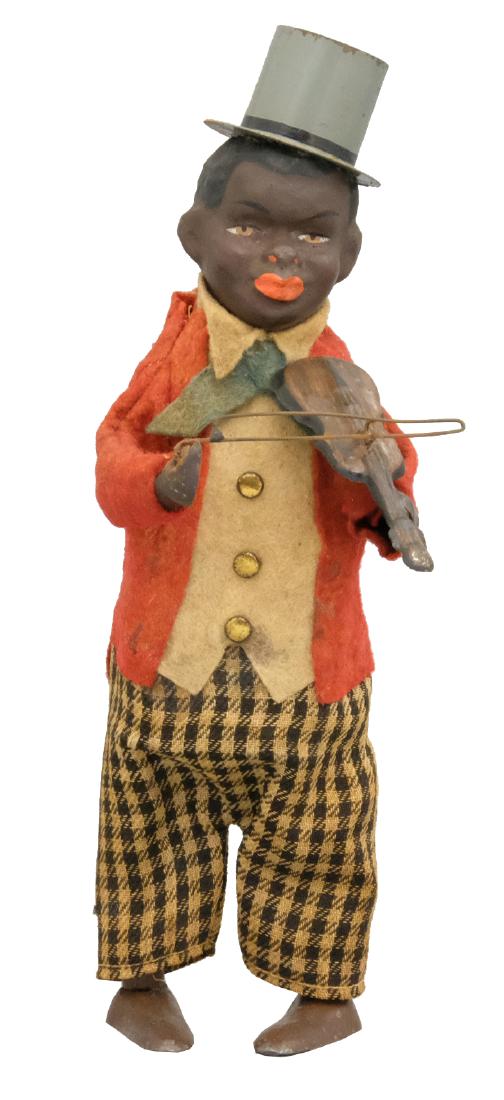 Black Musician with Violin: Possibly Gunthermann German - Circa 1920's - 9"T When operated, his head goes up and down and he plays the violin. Material: Tin, composition and fabric