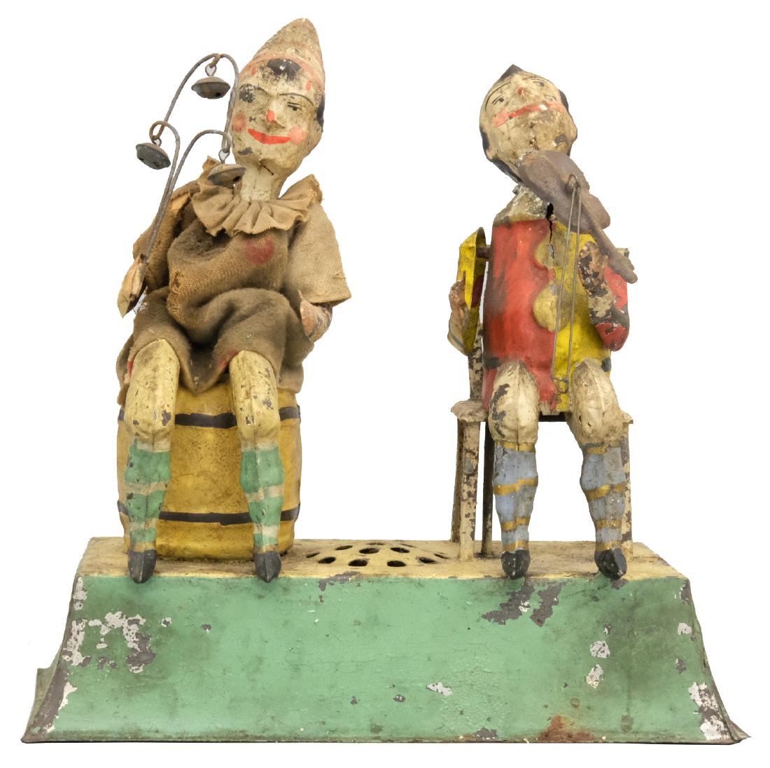 Two Clown Musicians: S.G. Gunthermann German - Circa 1910's - 8.75" L Material: Tin