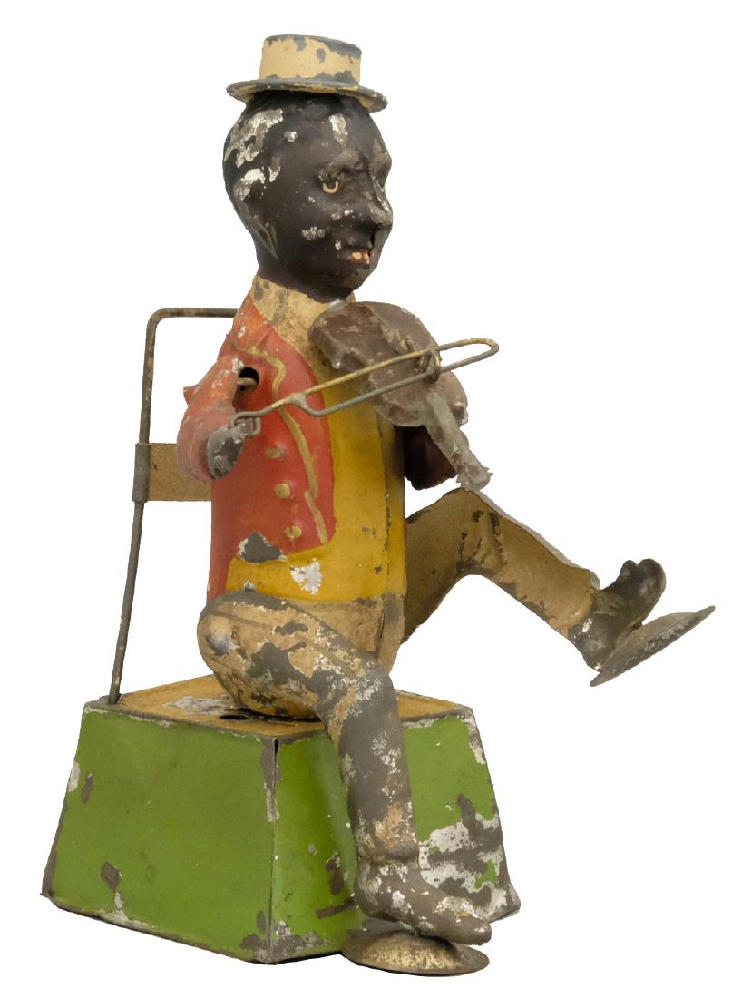 One Man Band: S.G. Gunthermann German - Circa 1910's - 6.75" T We have not seen this toy before. It presently is not working. Material: Tin