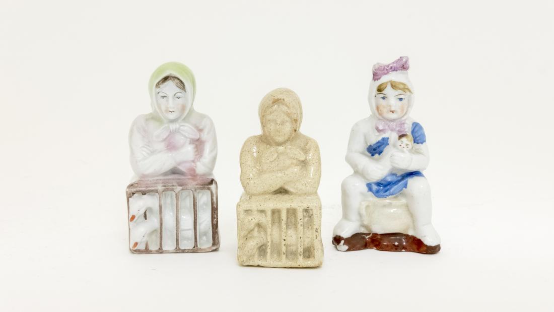 Two Women Seated with Duck Crates (1 of 1)