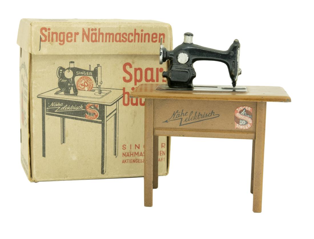Singer Sewing Machine: with Original Box German - 1935 Tin and Lead We have never seen the box for this bank before.