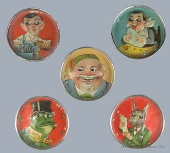 5 FANTASTIC DEXTERITY TOYS: 5 FANTASTIC DEXTERITY TOYS - All made in Germany circa 1920; all with a 2 3/8" diameter; all in Pristine condition; they include: toddler, frog with top hat, old man with beret, donkey reading paper a
