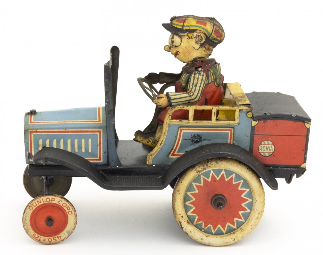 European "Crazy Car" Essoee: Essoee. German - 1920's - 6 3/4" L. We have never seen this colorful lithographed toy before. It appears to be based upon Louis Marx's Crazy Car design. A chance to land a rarity for the collection. I
