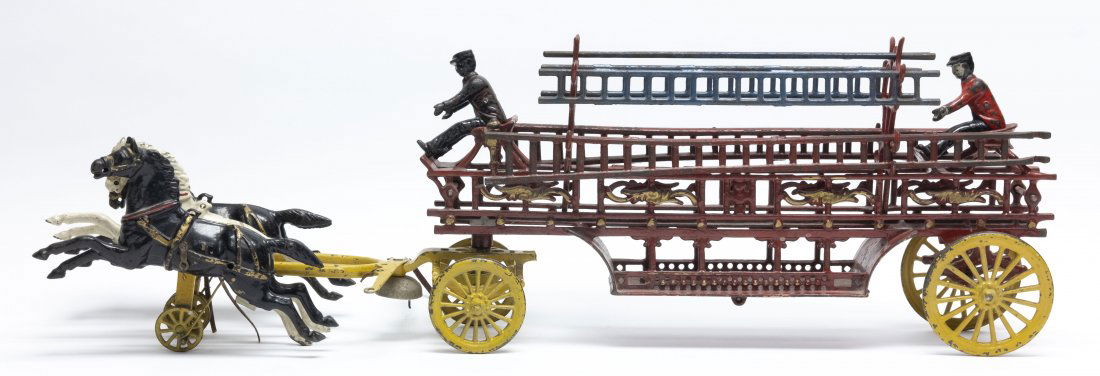 Dent Oversize Hook & Ladder Iron Toy: Dent Hardware. Fullerton, PA - 1905 - 31" L. This is an impressive and very colorful Oversized Hook & Ladder by Dent. Scarce with the body in red paint. The traces between the horses have an old-time