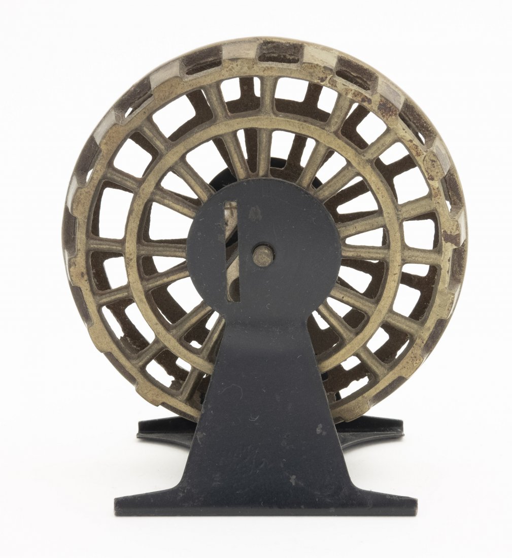 Water Wheel Iron Bank: American - 1905. This is a superior example of the bank with a nickel plated wheel. Cast Iron and Tin. Pristine Condition.