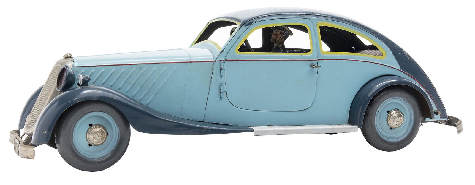 Rico Stream Lined Coupe: Spanish, Circa 1935, 13.25" L This beautiful car resembles a Marklin kit car of the day. The two toned blue is charming.