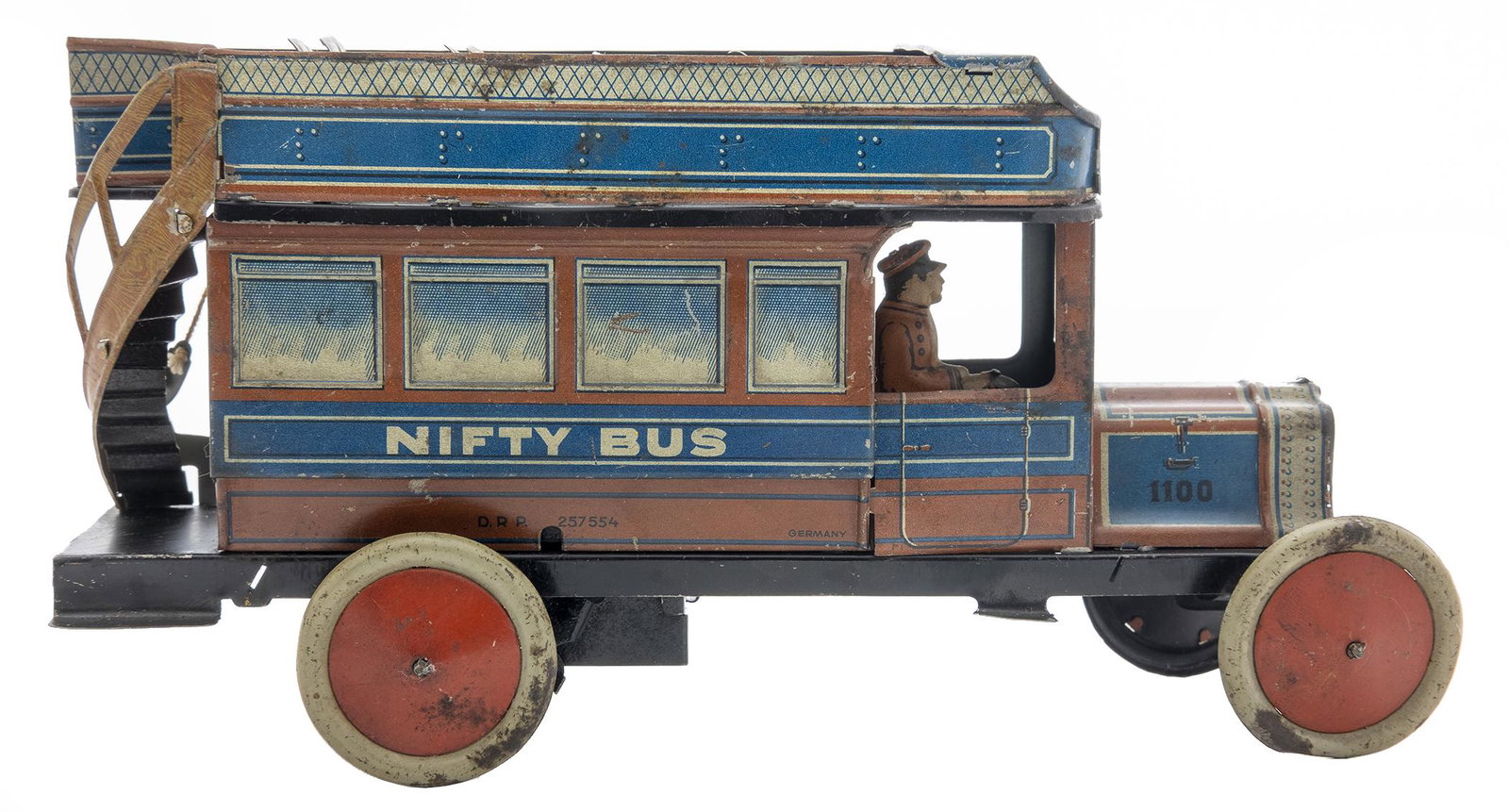 Nifty Double Decker Bus: German, Circa 1920's, 9.5" L This toy comes complete with a ringing bell. A scarce Nifty toy.