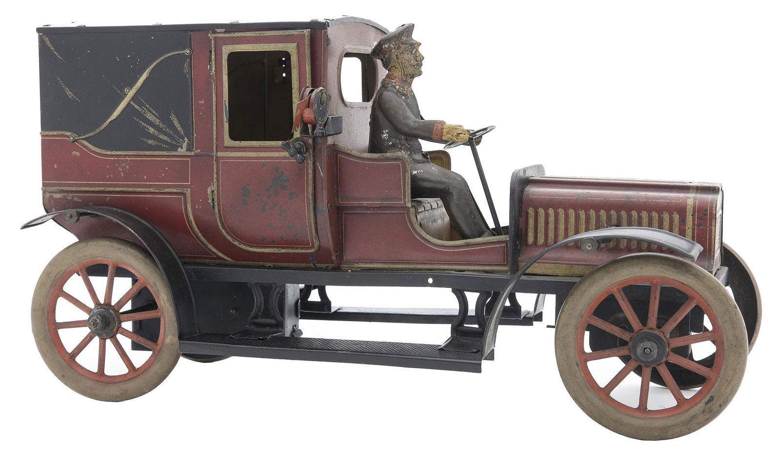 Carette Taxi Limousine: German, Circa 1918, 12.5" L This wonderful toy is an iconic image of early taxicabs.