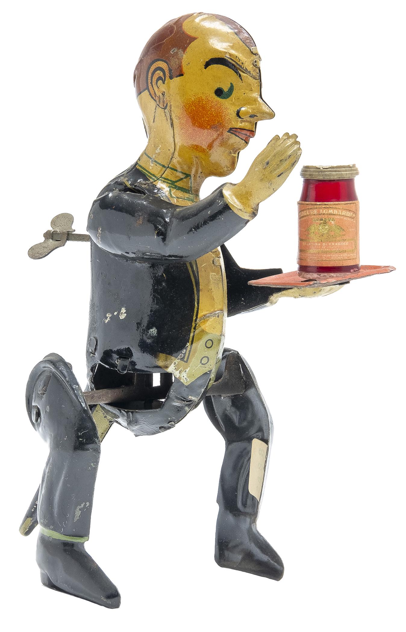 GAMA Waiter with Tray: German, Circa 1928, 6.75" T This toy employs both lithography and hand painting. It is quite scarce.
