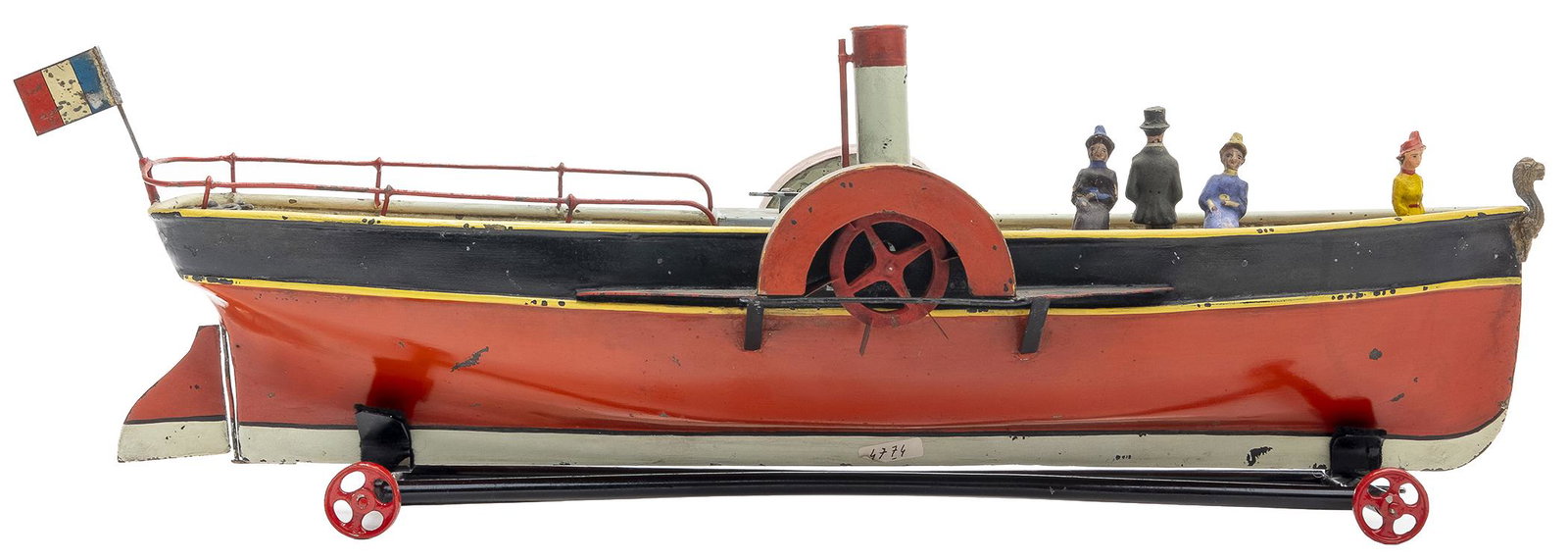 Early Paddlewheel Boat: French, 1890's, 20" L This beautiful boat is in superior condition with four original composition figures. It has a windup mechanism.