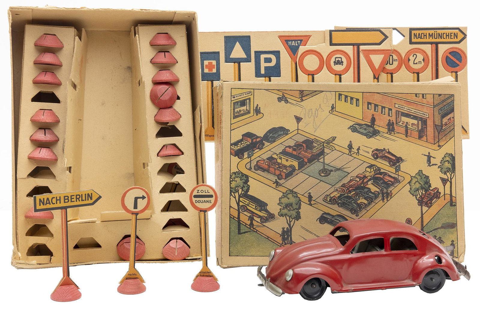 Kellerman "CKO" Boxed Volkswagen Beetle: German, 1938, 7.25" L This set complete with about 20 cardboard traffic signs mounted to wooden bases.
