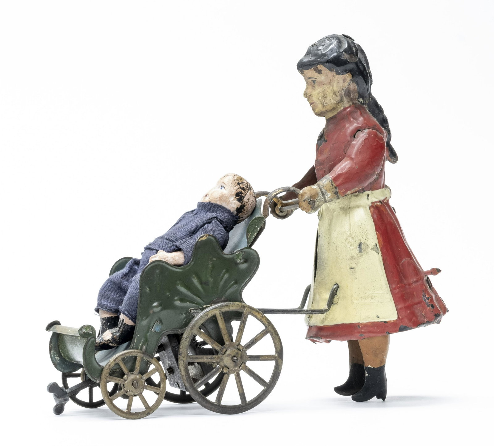Young Girl with Pram: German - 1915 - 7.5" L This toy is fairly scarce and desirable. It depicts a young mother or older sister pushing a young boy. The girl with significant paint restoration. Fine (See Description)