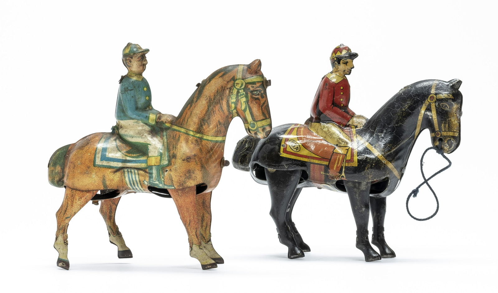 Two Jockey Toys: Spanish/German - 1930 - 5" L The black one marked "RSA" is Spanish and somewhat scarce. Fine / Excellent Condition.