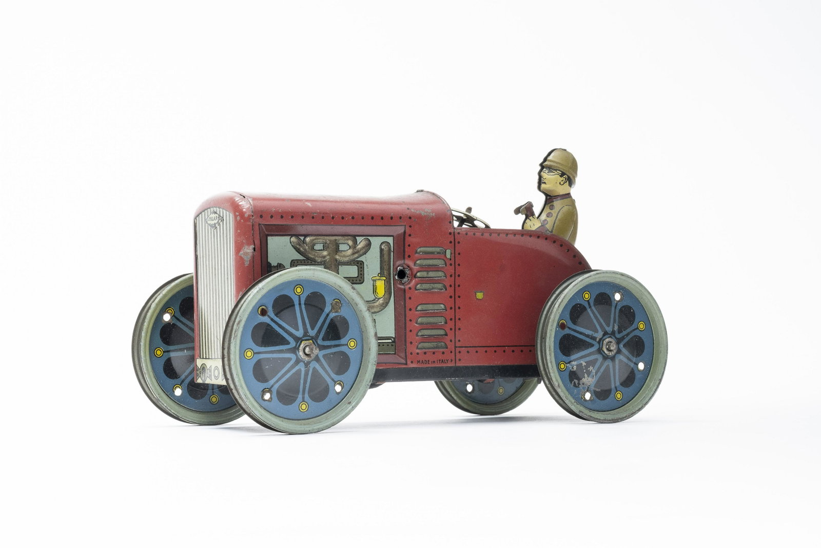 Ingap Tractor: Italian - 1920's - 7.75" L Quite colorful and charming. Missing its rubber treads. Very Fine (See Description)